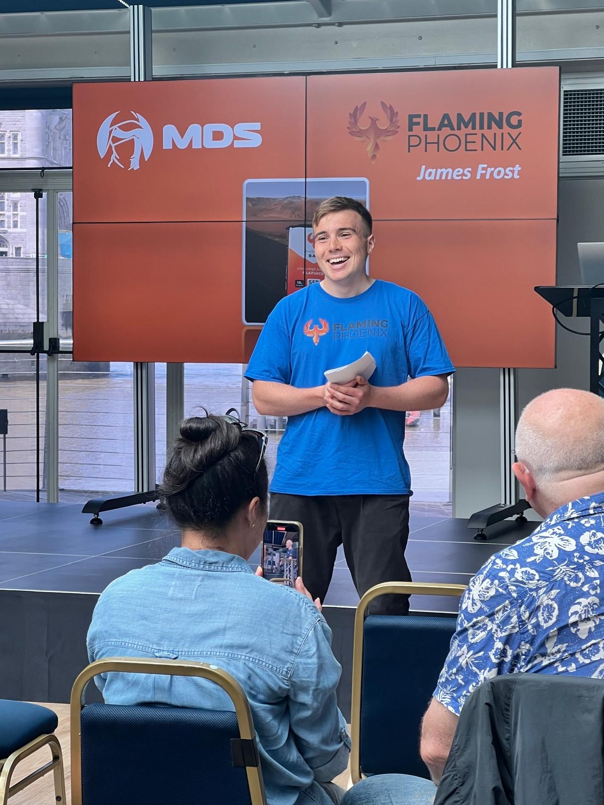 James Frost at the Flaming Phoenix stand at a Marathon des Sables event