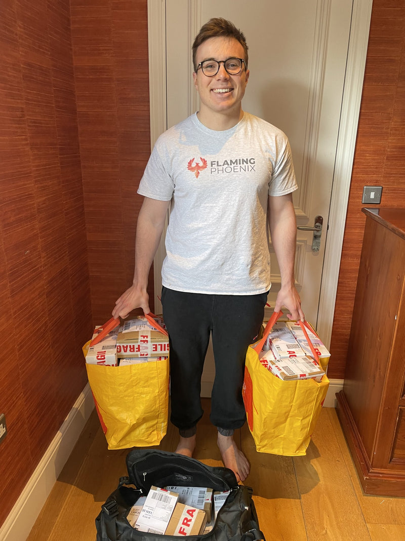 James with bags of orders ready to post