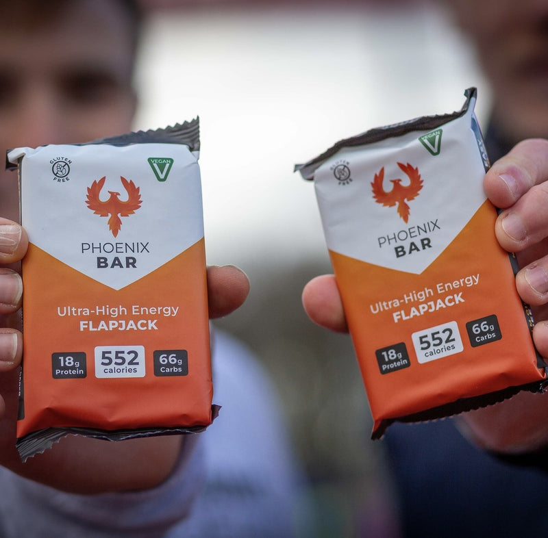Two Phoenix Bars held up to the camera