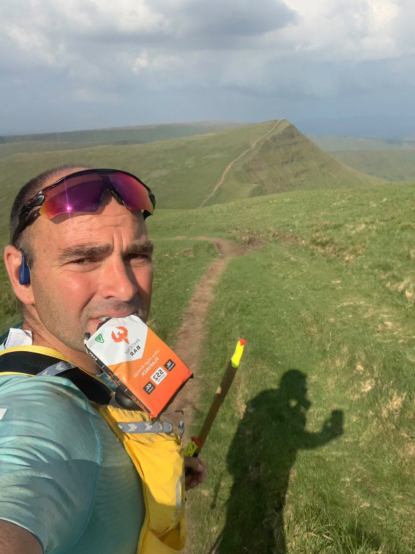 A trail runner with a Phoenix Bar